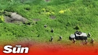 Incredible video shows Ukrainian soldiers in Humvees storming Russian trenches [upl. by Rafferty]