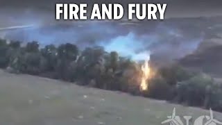 Watch moment Ukraine uses fleshmelting ‘flamethrower drone’ to burn Russians out of trees [upl. by Jada588]