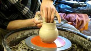 Making throwing a simple flattened clay pottery salt holder on the wheel [upl. by Key]