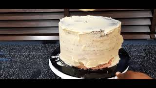 How to Crumb coat your Cake before Covering  Frosting it [upl. by Mall]