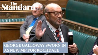 George Galloway sworn in as new MP for Rochdale [upl. by Fadas369]