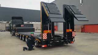 Hydraulic expandable platform Low loader semitrailer 4 axle hydraulic widening low loader trailer [upl. by Hibbs]