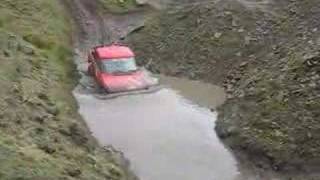 Range rover bobtail wading in bomb hole [upl. by Idnarb]