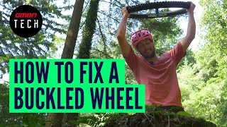 How To Fix A Buckled Mountain Bike Wheel  MTB Trailside Repair [upl. by Schechinger]