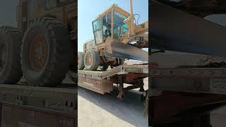 motor grader unloading trailer [upl. by Pyne]