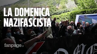 Saluti romani svastiche e selfie con bambini lestrema destra ricorda Mussolini a Como [upl. by Euf]