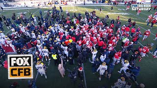 Massive SCUFFLE ensues after Michigan tries to plant flag on Ohio States logo [upl. by Murielle649]