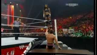 Aj kisses amp pushes Cm Punk through a table [upl. by Aihpled]