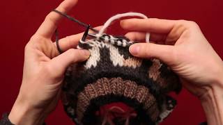 Trapping the Yarn English  KnittingHelpcom [upl. by Lyford]