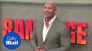 Dwayne The Rock Johnson is all smiles at Rampage premiere  Daily Mail [upl. by Akin741]