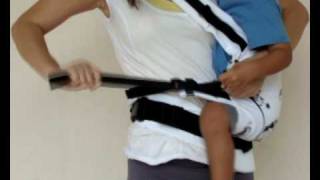 Manduca Baby Carrier Instructions  Switching from Cross Strap Front Carry to Hip Carry [upl. by Obelia]