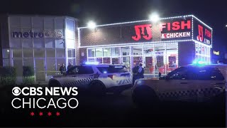 Employee shoots kills 2 men inside fast food restaurant on Chicagos South Side [upl. by Anoerb734]