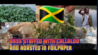 4k HOW TO ROAST FISH🐟 STUFFED WITH CALLALOO IN FOILPAPER ON CHARCOAL🐟 BASS CATCH CLEAN AND COOK [upl. by Eibbob]