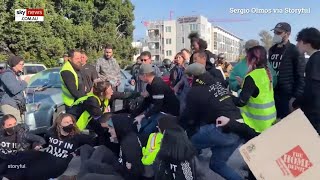 Protesters block major LA freeway and clash with commuters [upl. by Ateloiv]