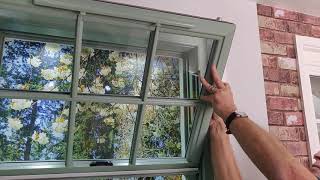 How to fit the top sash on PVCu Sliding Sash Windows [upl. by Annasor539]