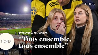 Attentat à Bruxelles  lélan de solidarité des supporters belges avec les Suédois [upl. by Eidak]