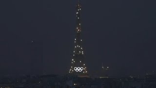 Eiffel Tower sparkles during Olympic opening ceremony  AFP [upl. by Kort516]