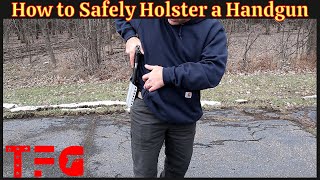 How to Safely Holster a Handgun  TheFirearmGuy [upl. by Ennahoj583]