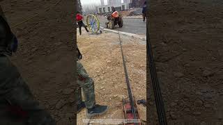 Use A Tractor To Pull Pipe Cables Through A Manhole [upl. by Hebert]