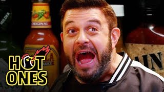 Adam Richman Fanboys Out While Eating Spicy Wings  Hot Ones [upl. by Cigam]