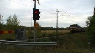 Express train 705 passes Kaatopaikka level crossing [upl. by Acsirp421]