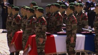 Funeral caskets of fallen French soldiers arrive at Invalides [upl. by Bigler471]