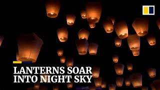 Thousands of sky lanterns soar into the night sky In Taiwan carrying people’s wishes [upl. by Bathulda217]