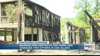 Massive fire destroys one home and damages two others in Oak Island [upl. by Ariaj]