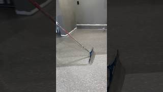 Pushing clear coat on an epoxy flake garage floor asmr satisfying construction [upl. by Aerdnahs]