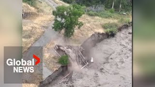 BC landslide Structure washed away after water tops Chilcotin River site video shows [upl. by Rramel507]