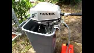 2004 Honda 5hp 4 stroke tiller outboard motor [upl. by Legnaesoj]