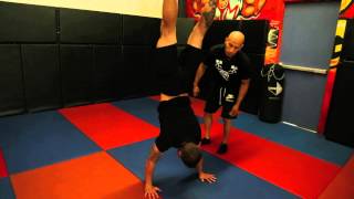 How To Perform A Handstand with Frank Medrano at Metroflex LBC [upl. by Nogaem]