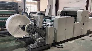 1100mm roll paper sheeting and crossing cutting machine with 40gsm silicone baking burger paper [upl. by Nesyla823]