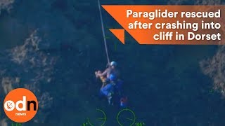 Paraglider rescued after crashing into cliff in Dorset [upl. by Llennyl158]