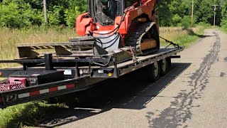 kioti TL750 brush hogging with a wolverine 72 inch brush cutter [upl. by Asyen]