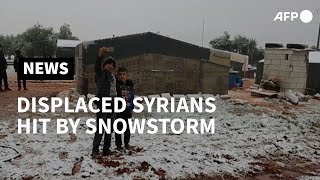 Displaced Syrians hit by snowstorm in Idlib  AFP [upl. by Ramad]