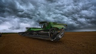 Custom Wheat Harvesters Come To A Halt [upl. by Leahcimauhsoj]