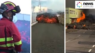 Lava oozes onto streets after Canary Islands volcano eruption [upl. by Oicnoel256]