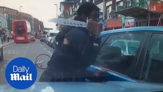 Shocking moment cyclist pulls knife on driver in fit of road rage [upl. by Mata272]