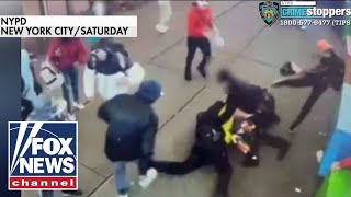 Migrants attack NYPD officers in shocking video [upl. by Sirtimed]