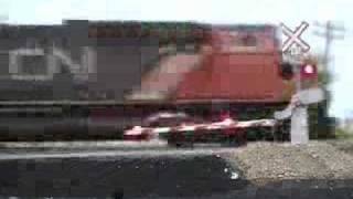 CN grain train at rural crossing [upl. by Schmidt]