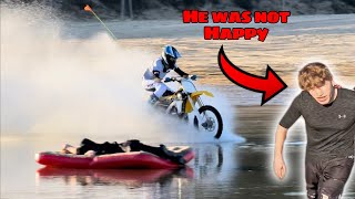 Water skipping across pond Prank crashes dirtbike [upl. by Buyer689]