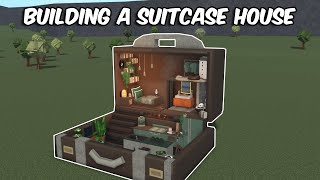 BUILDING A SUITCASE HOUSE IN BLOXBURG [upl. by Teiluj878]