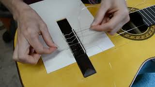 Changing Strings  12 hole bridge classical guitar [upl. by Ania36]