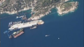 Costa Concordia Rare aerial footage of the stricken liner [upl. by Hayikat992]