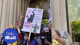 May Day protesters demonstrate outside Amazon boss Jeff Bezos apartment in New York [upl. by Gollin565]