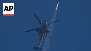 Israeli helicopter seen firing missiles over border area with Lebanon [upl. by Edgar]