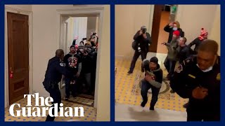 ProTrump mob chases lone Black police officer up stairs in Capitol [upl. by Volnay]