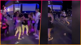 Shocking moment British tourists fight over a MAN at Malia resort as stunned crowd looks [upl. by Bunde]