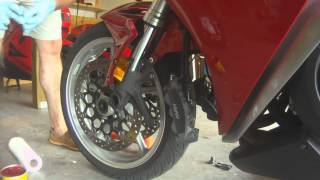 Honda VFR 1200 Front Wheel Removal [upl. by Nedle]